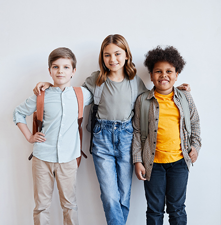 Three children standing together